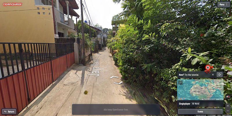 Screenshot of OpenGuessr showing a street-view location guessing game